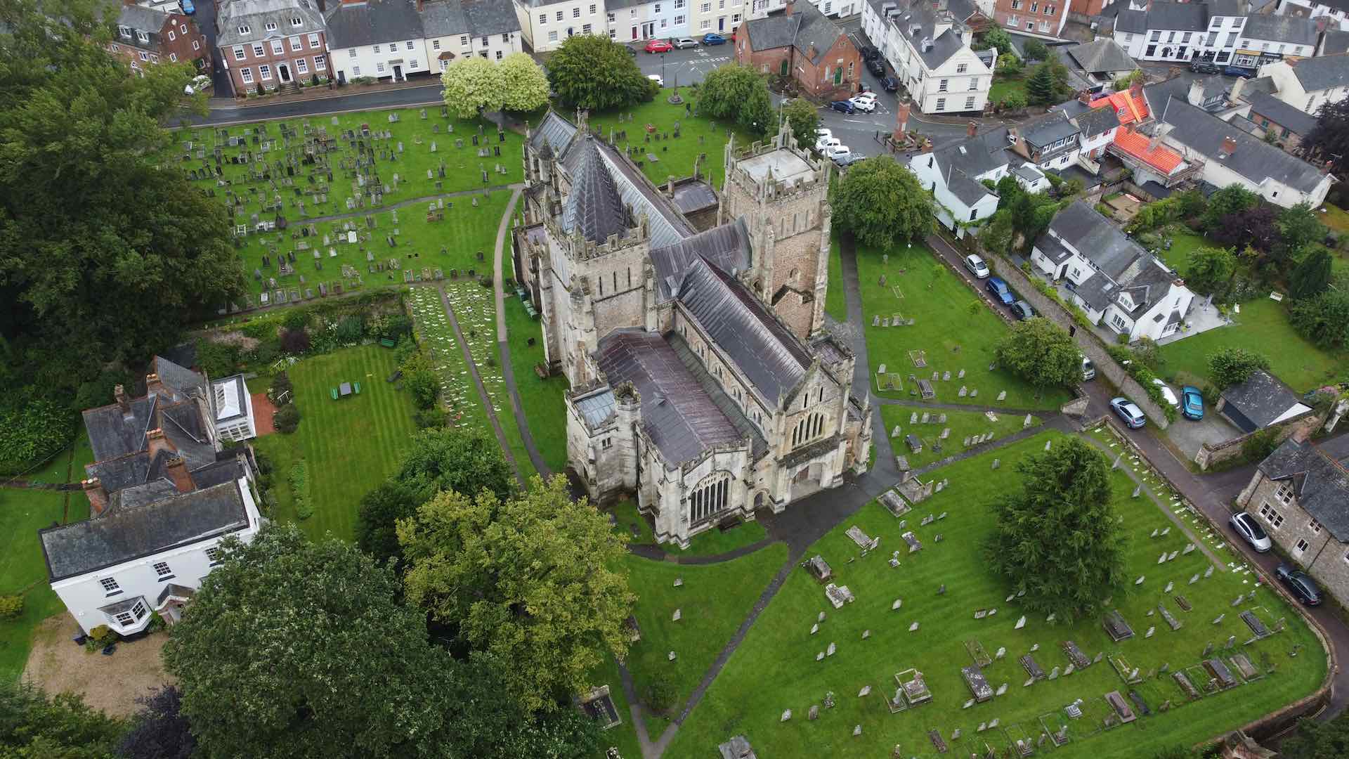 An aerial photo of Ottery St Mary Church and its churchyard