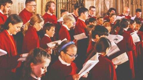 A picture of a group of choristers from Exeter Cathedral singing