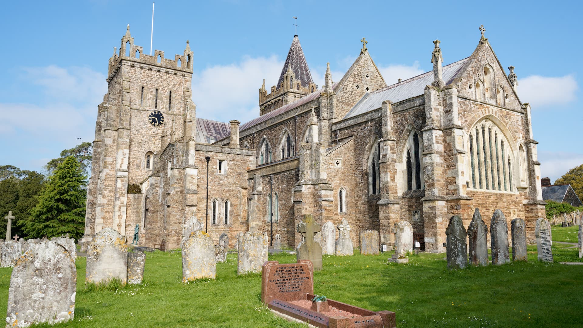 A view across the church yard to the south-side of Ottery St Mary church