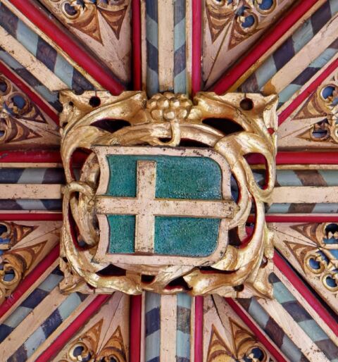 A view of one of the ceiling bosses in Payhembury church depicting the crucifixion cross