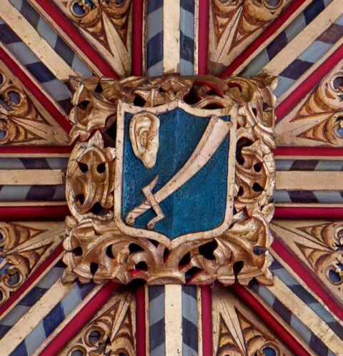 A view of one of the ceiling bosses in Payhembury church depicting the ear of the slave cut off by St Peter and his sword