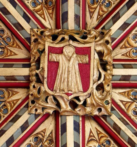 A view of one of the ceiling bosses in Payhembury church depicting the crucifixion robe