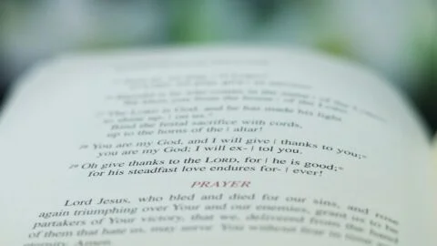 Open bible showing a prayer section