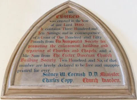 A view of the consecration plaque at Tipton St John church