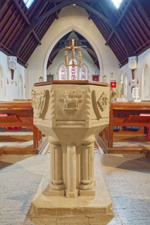 A view of the stone font in West Hill church